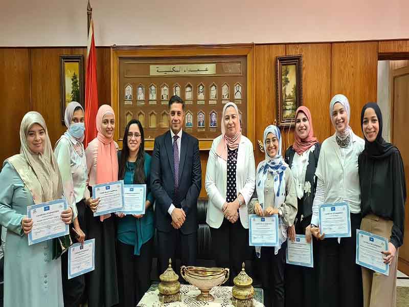 The Dean of Faculty of Al-Alsun honors the students of the United Nations training program