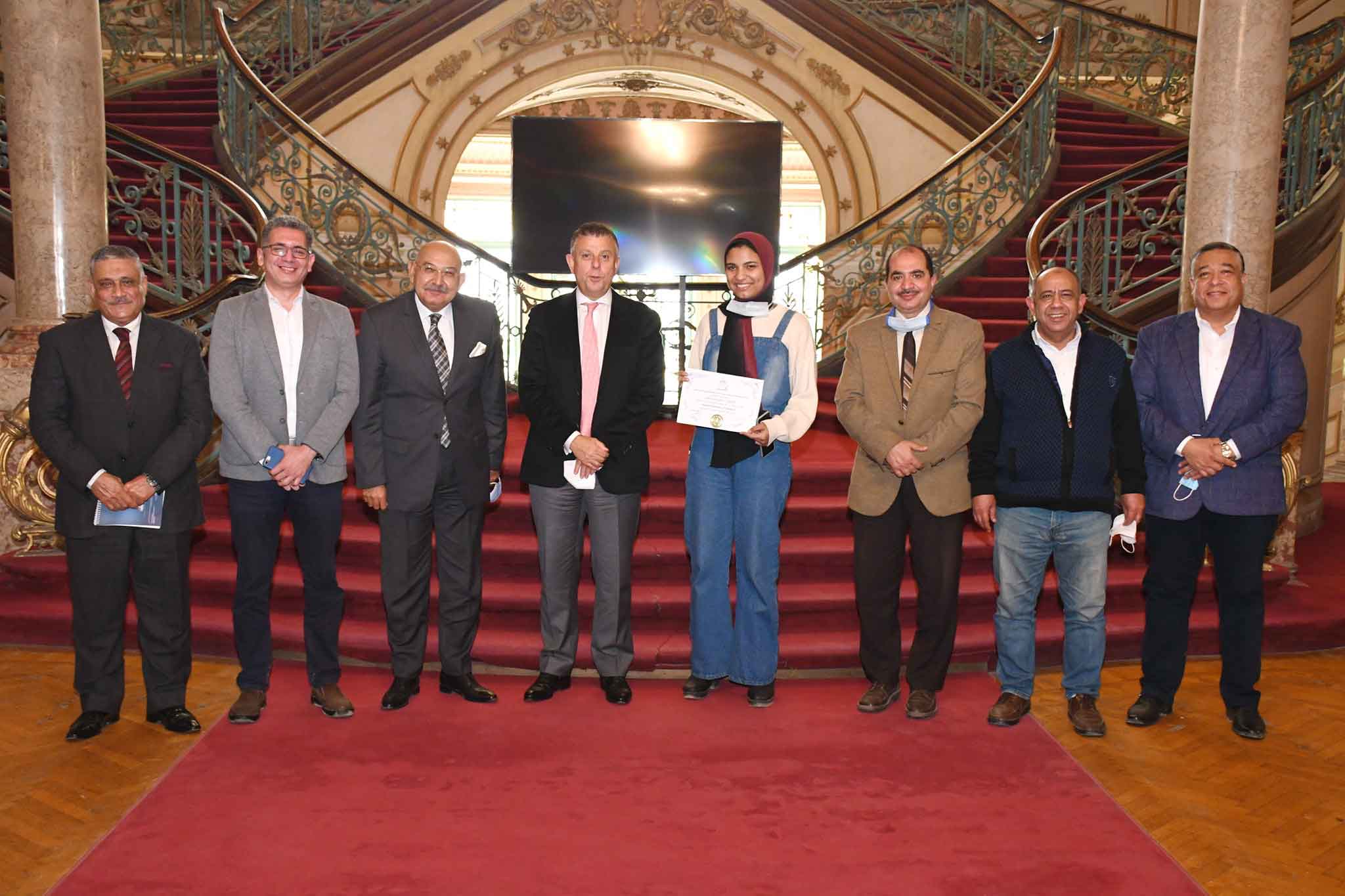 Ain Shams University President honors student Samar Hani for winning the gold medal in the Greater Cairo Kung Fu Championship (General Major)